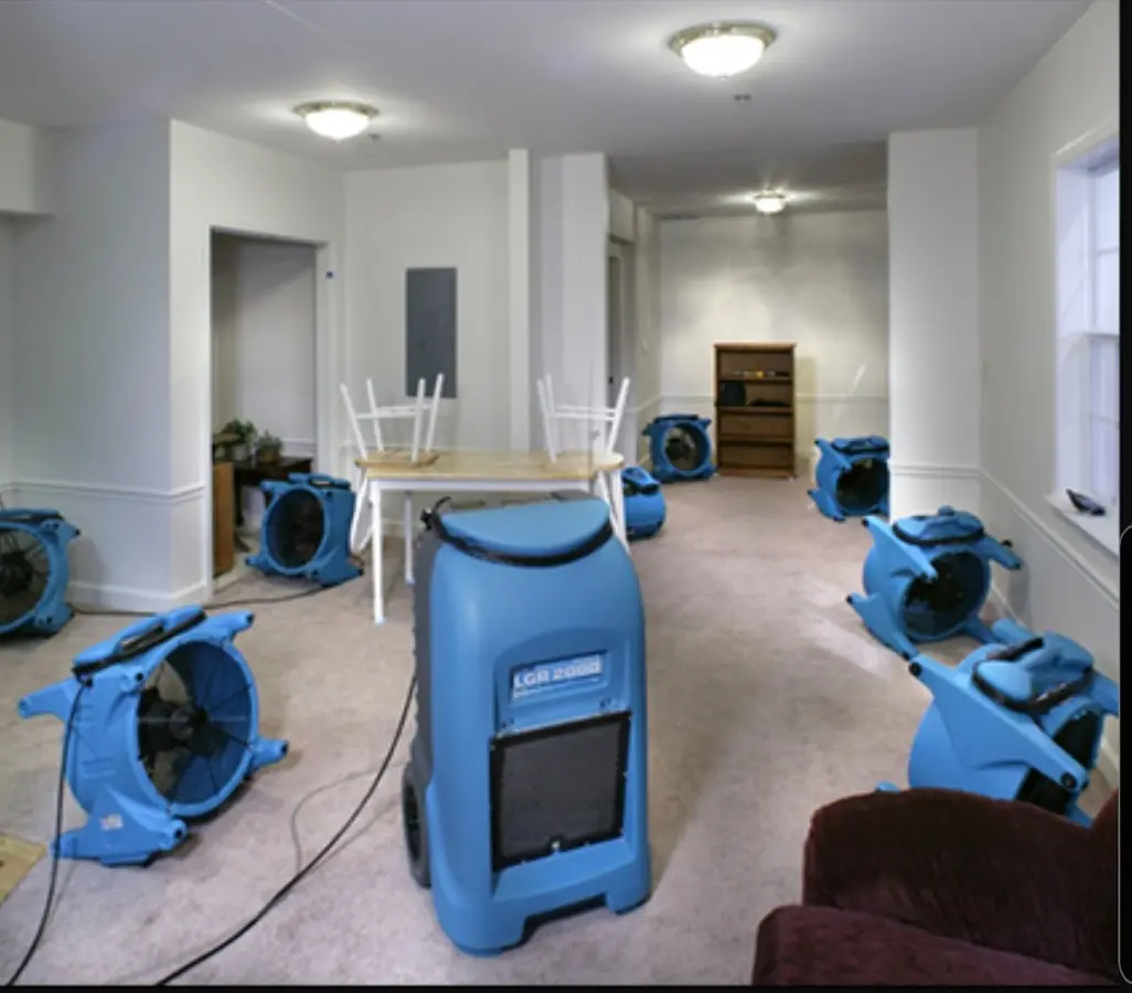 Air movers and dehumidifier setup for Water Damage Restoration in Townsend